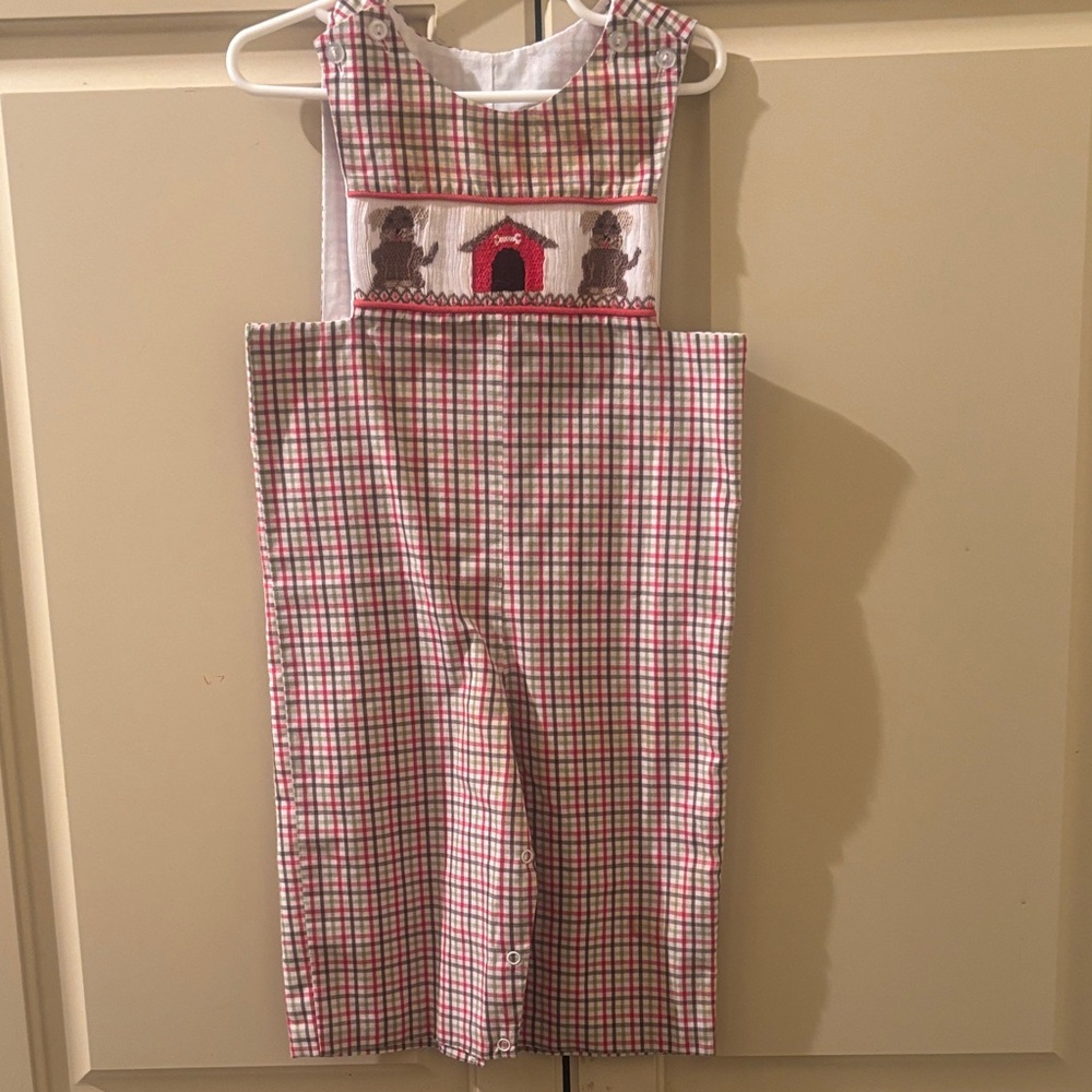 Red, brown, green plaid smocked puppy romper 
Size: 18M
Brand:True